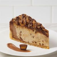 Cheesecake Factory Reese's peanut butter cheesecake · Rich chocolate cheesecake with peanut butter cups topped with chopped Reeses peanut butter c...