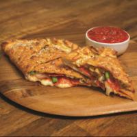 Deluxe Calzone 	 · Stuffed with pepperoni, Italian sausage, mushrooms, green peppers, onions and our signature ...