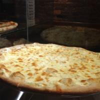Pizza Bianca · Mozzarella cheese, ricotta cheese, a bit of Parmesan cheese