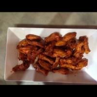 BBQ Chicken Wings (7 psc.) · Blue cheese dressing, celery, and carrots