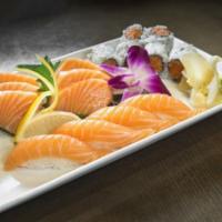Salmon Lover · 4 pieces of sushi, six pieces of sashimi and one crunchy salmon roll. Served with soup or sa...