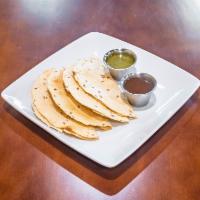 Papadums · Spiced lentil wafers, fried or roasted.