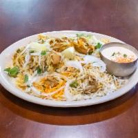 Hyderabadi Dum Biryani · A South Asian rice specialty, cooked with your choice of meat or mixed vegetables. Served wi...