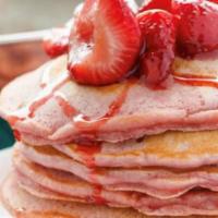 Strawberries N Cream Pancakes · It’s summer time come indulge in these delicious strawberry pancakes topped with powdered su...