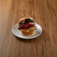 Grilled Chicken Sandwich · Grilled chicken on a round roll with lettuce, tomato and onion with Swiss cheese, bacon and ...
