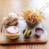 Gluten Free Woodbines Burger · With Irish cheddar cheese, thick Irish bacon and Irish coleslaw. Made with all-natural, gras...