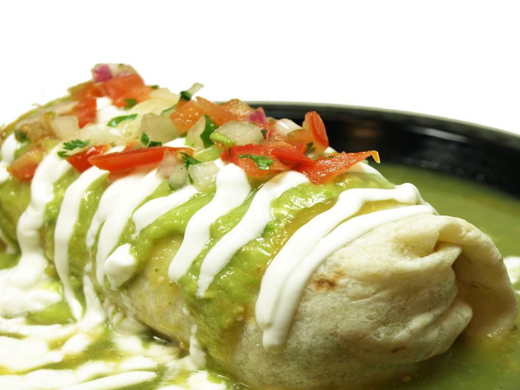 Chile Verde Burrito · Chile Verde (pork), rice and beans inside, with sour cream, pico de gallo, and mild green sauce on top.