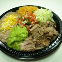 #13. Carnitas Plate Combo · Shredded pork carnitas, with lettuce, pico de gallo and guacamole. Rice and beans with chees...