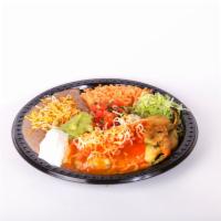 #15. Two Chiles Rellenos Combination · Two chile rellenos with enchilada sauce on top, lettuce, pico de gallo, guacamole and sour c...