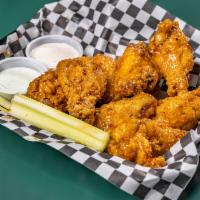 Boneless Buffalo Wings · Tender strips breaded and dipped in your choice of wing sauce. Served with ranch and blue ch...