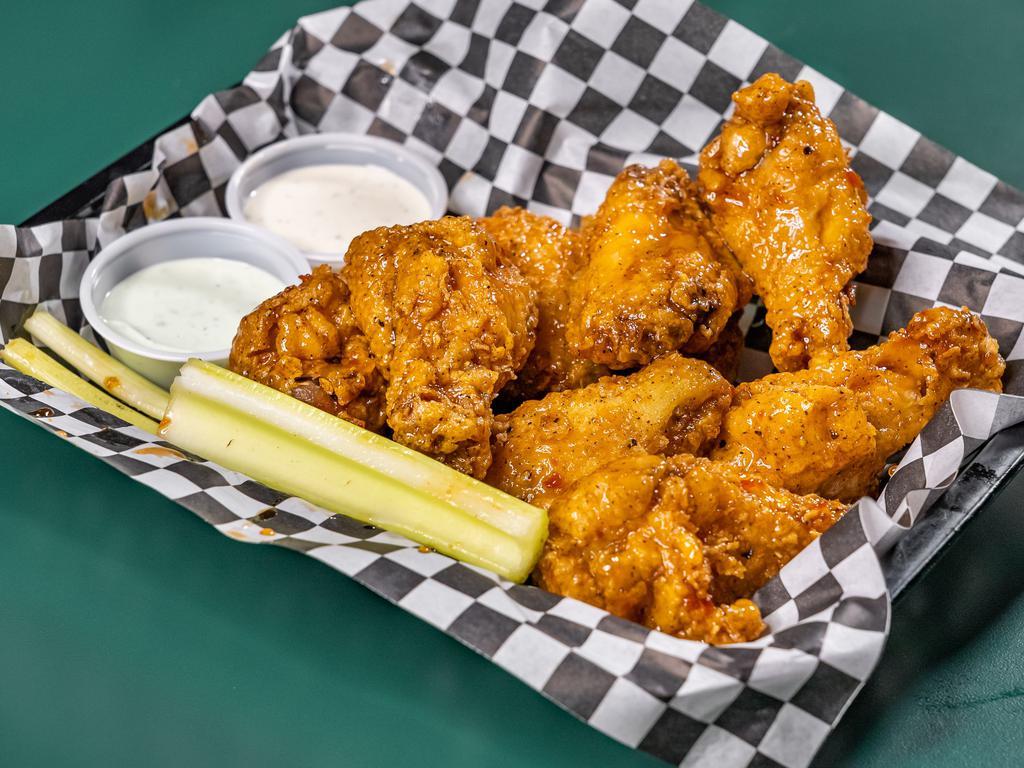 Boneless Buffalo Wings · Tender strips breaded and dipped in your choice of wing sauce. Served with ranch and blue cheese.