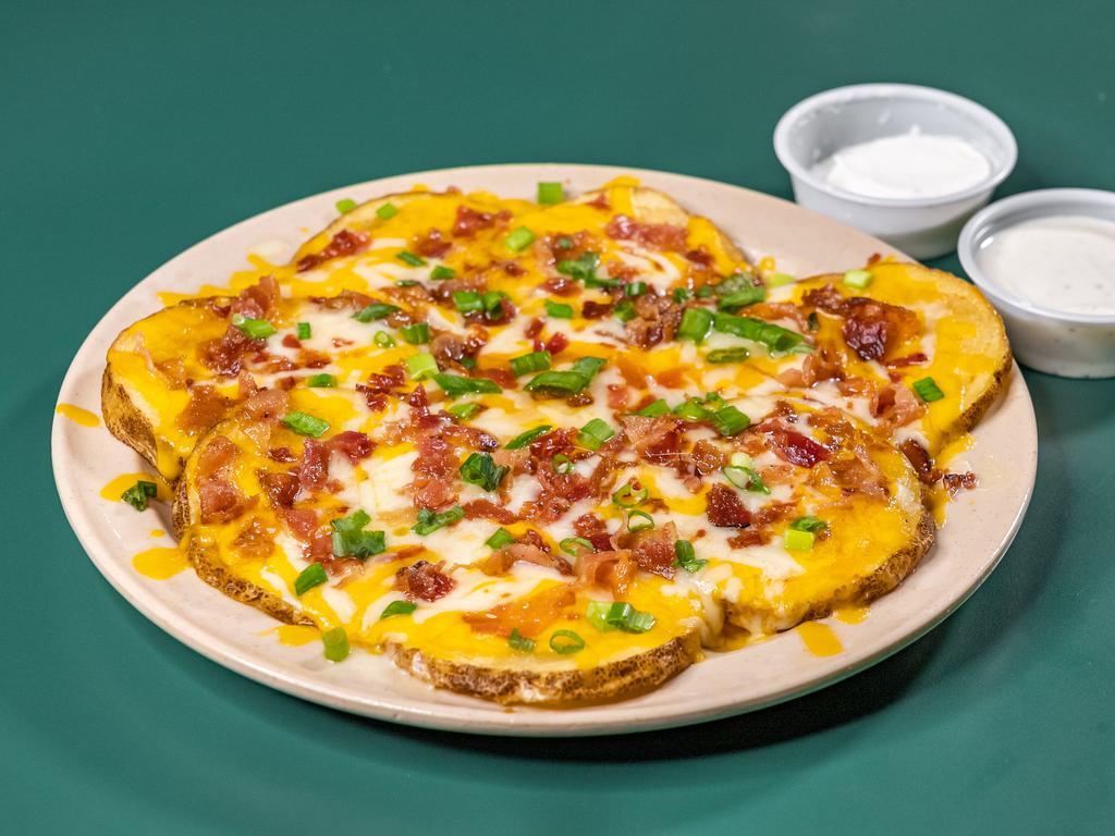 Irish Medallions · Potato rounds with jack and cheddar cheese, bacon chips and scallions.
