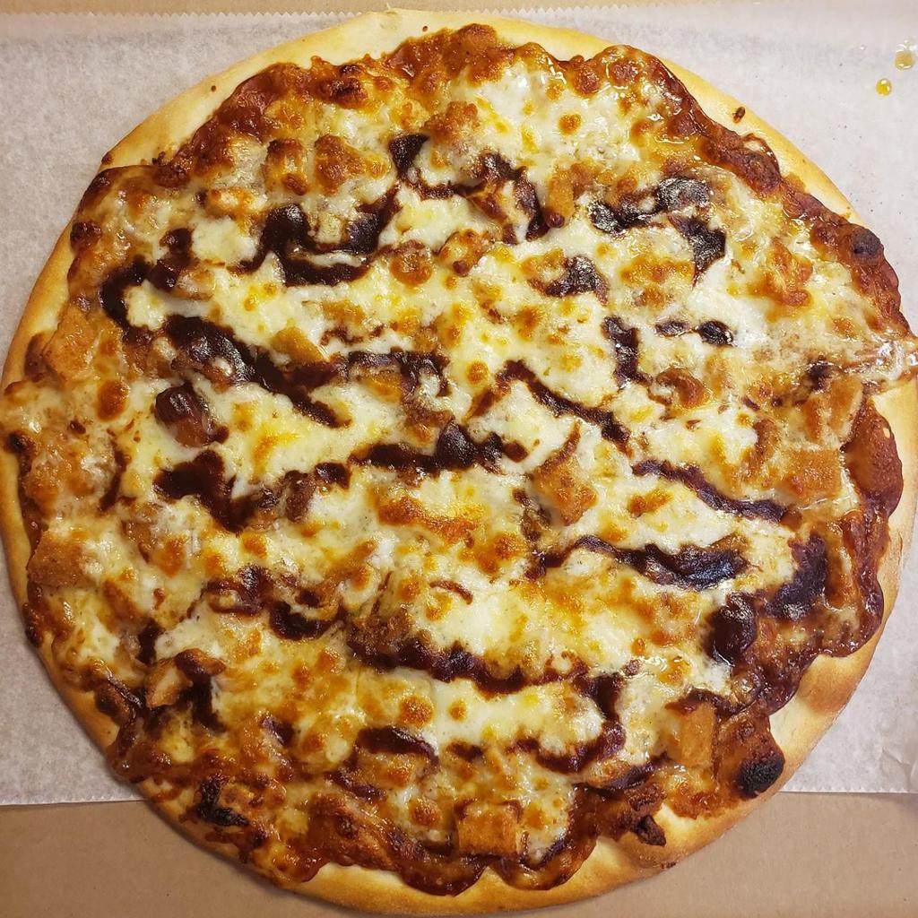 BBQ Chicken Pizza · Fried chicken in our homemade BBQ sauce with mozzarella.