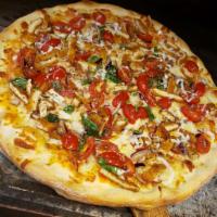 Chicken Bruschetta Pizza · Chicken cutlets, red onions, tomatoes and extra virgin olive oil.