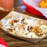 SIDE Dirty Mac · Mac-N-Cheese topped off with Shredded Hot Chicken and Ranch