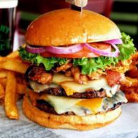 Double cheese burger · Mayonnaise, ketchup, lettuce, tomato, onions and pickles