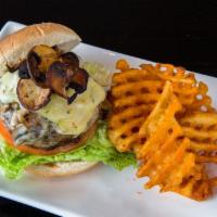Atomic Shroom Burger · Charbroiled with melted Swiss, loaded sauteed mushrooms and crispy onions.