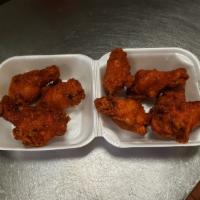 8 Piece Wings · Served with hot sauce and blue cheese on the side.