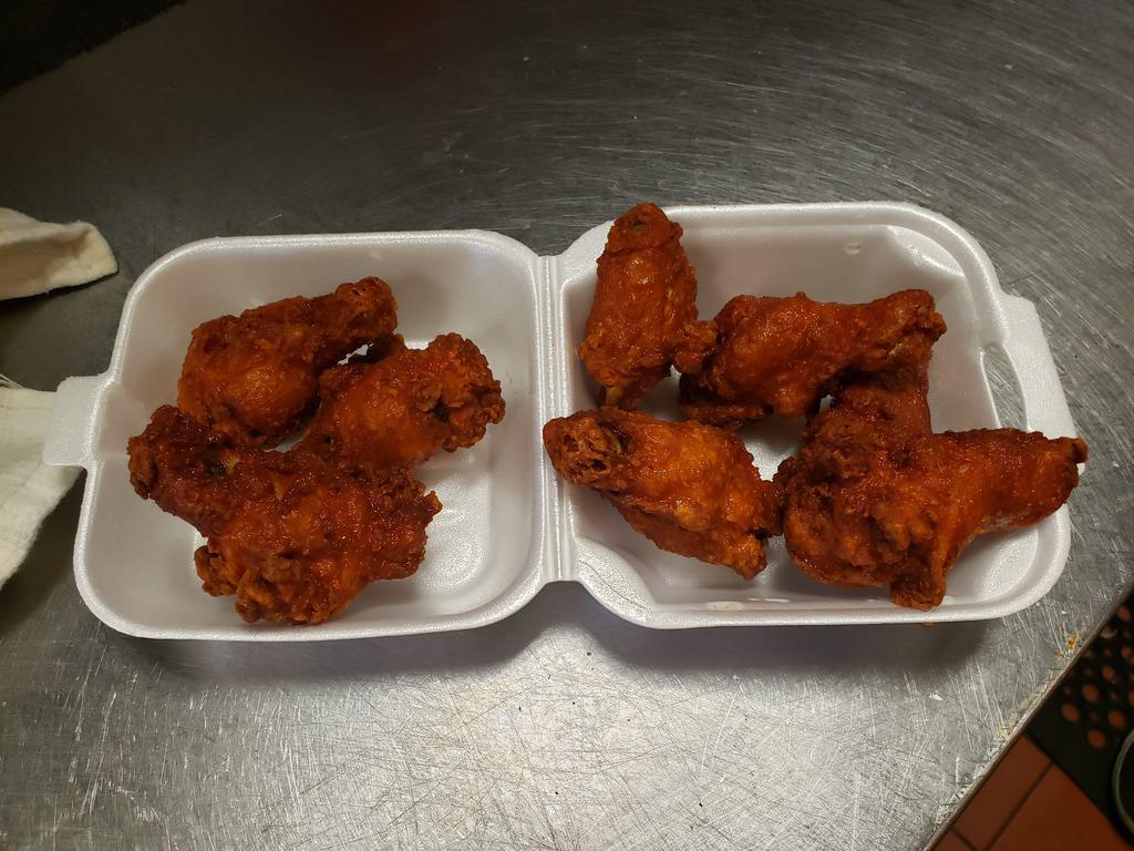 8 Piece Wings · Served with hot sauce and blue cheese on the side.