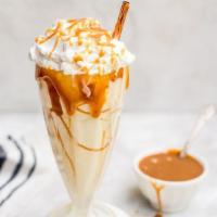 Salted Caramel Milkshake · Vanilla ice cream mixed with salted caramel syrup and topped with caramel sauce.