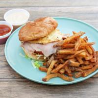 Hawaiian Burger · 1 ¼ lb. beef patty, ham, pineapple, fresh lettuce, onion, tomato, ketchup and Ever’s sauce.