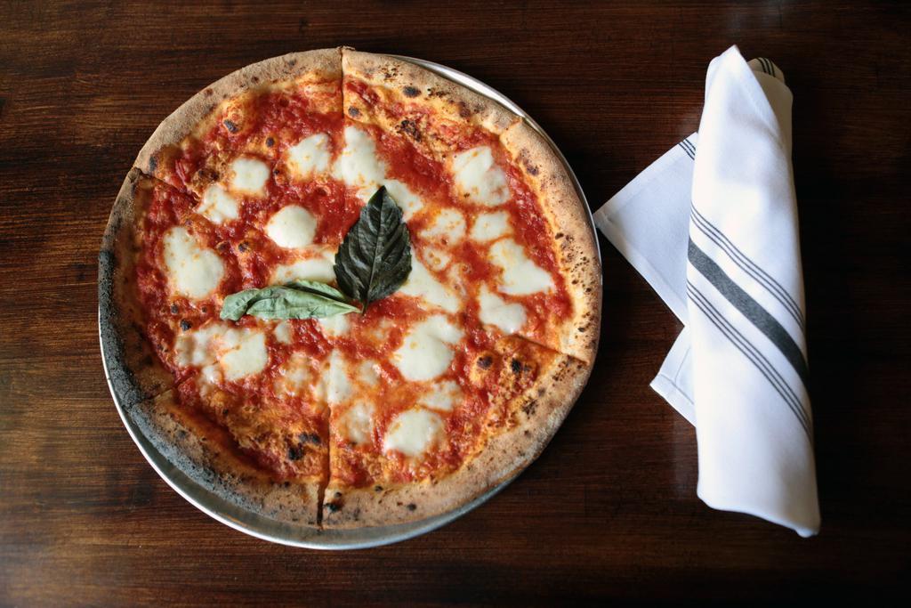 Margherita Pizza · Tomato, basil and fresh mozzarella.