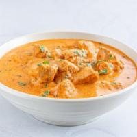 Butter Chicken · Fresh sliced chicken breast, tomato sauce, and a slew of aromatic spices.