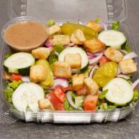 Italian Table Salad · Romaine lettuce, grape tomatoes, red onion, cucumber, pepperoncini, and croutons.