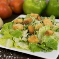 Caesar Salad · Romaine lettuce, Caesar dressing, Parmesan, and croutons.
