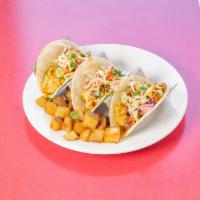  Breakfast Street Tacos · 3 pieces tacos, stuffed with spicy chorizo,
egg, and chopped pico.