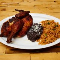 1/2 Rostisserie Chicken Platter · Served with rice and beans on the side.
