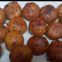 Pionono · Sweet plantains stuffed with beef and puerto rican spices in the shape of a ball.