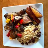 Jamaican Jerk Chicken · Chicken quarters seasoned with select island Jerk seasoning  and extra garlic. Marinated ove...