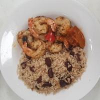  Grilled Jerk Shrimp  · Medium to large shrimp seasoned in jerk sauce and grilled. Served with white rice or rice an...