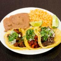 3 Taco Special (hand make tortilla) · 3 Corn Tacos w/rice & beans