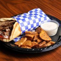 Gyro Wrap · Served on grilled pita bread with onions, tomatoes and Nick's Grecian sauce.