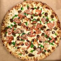 Original Greek Sesame Pizza · Feta cheese, sausage, green pepper, tomato. Sprinkled with sesame seeds and Dolly's famous G...
