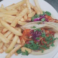 Spicy Chicken Tacos · K style marinated spicy chicken, Kimchi, cabbage, kale and spicy mayo with fries.