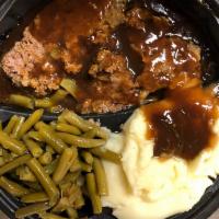 Homemade Meatloaf · Served with mashed potatoes and gravy and green beans.