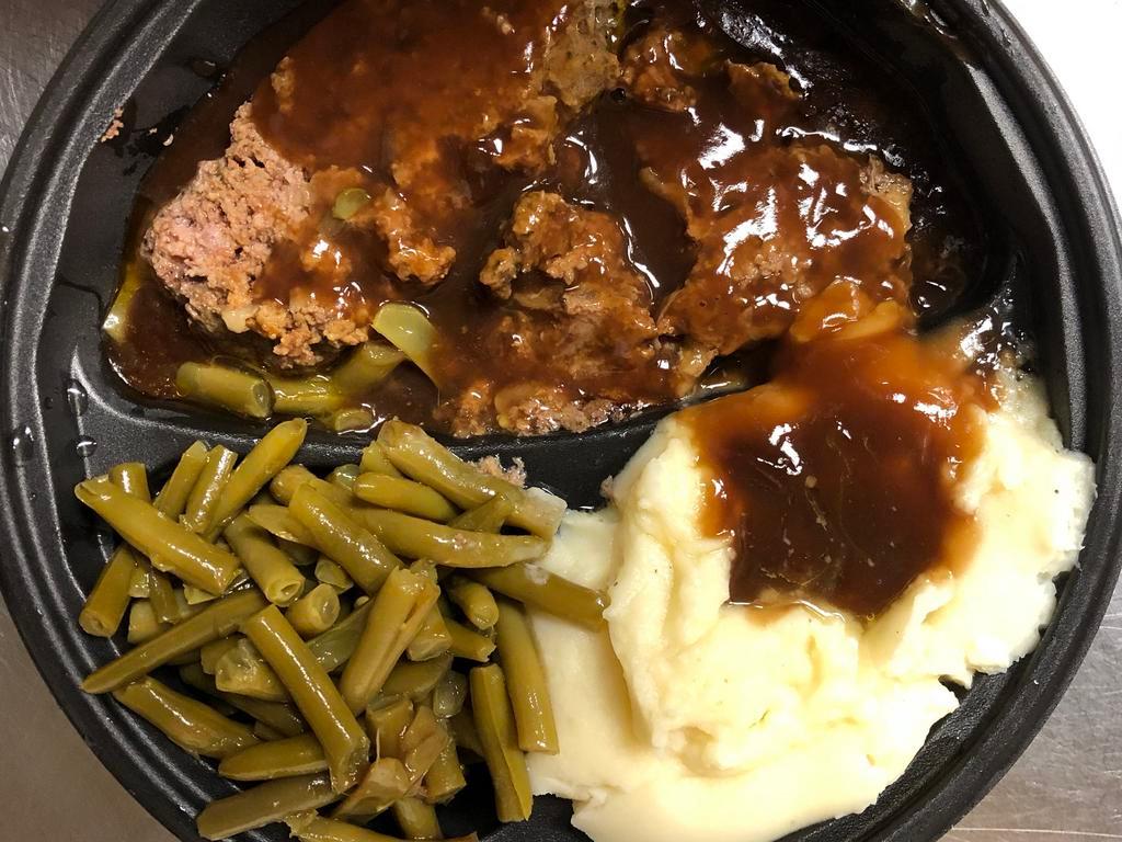 Homemade Meatloaf · Served with mashed potatoes and gravy and green beans.