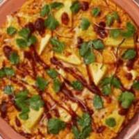 Vegan Empowered BBQ Pizza · Vegan pie with tomato sauce, pineapple, red onion, cilantro, bbq sauce, and vegan cheese.