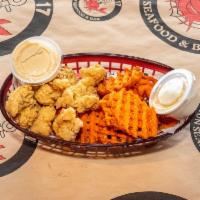 Fried Gator Tail Basket · Cooked in oil.