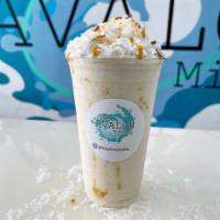 Tropical Twist Smoothie · Mango pineapple and coconut.