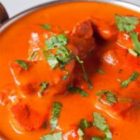 Chicken Tikka Masala  · Chicken breast tenders marinated in spices and yogurt then barbecued in a tandoor oven and c...