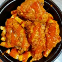 Chicken wings  · Seasoned wings with fresh cut fries.