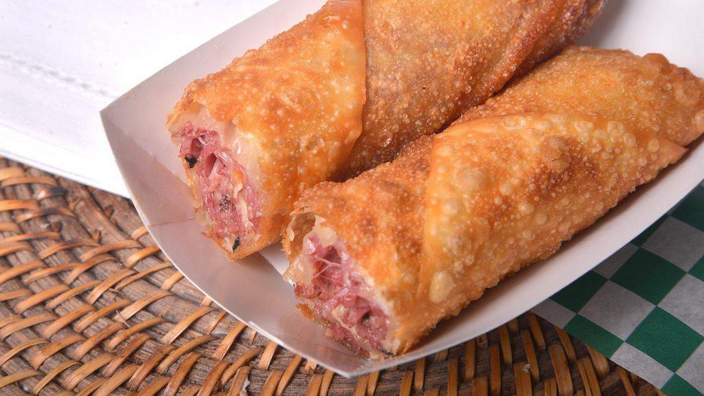 Corned Beef Eggroll · Made fresh with Wigley's Corned Beef, Swiss and Mozzarella Cheese. Each comes with sweet and sour sriracha. 