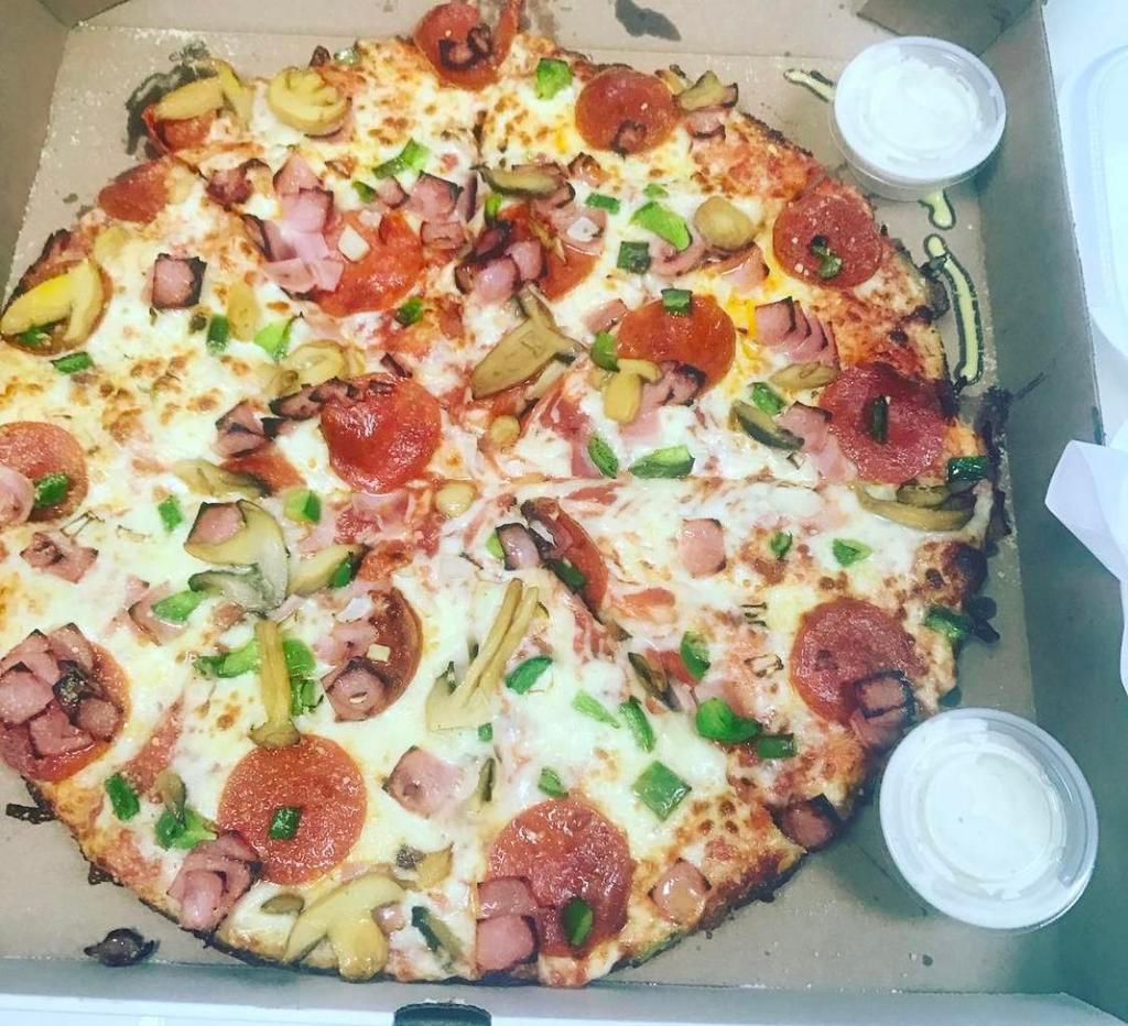 Supreme Pizza · Pepperoni, ham, onions, green peppers, banana peppers, and mushrooms.