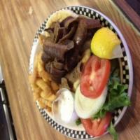 Gyro Platter · Fresh off the cone served with fries, pita, tomatoes, onions, Tzatziki sauce and soup or sal...