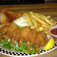Jumbo Shrimp Dinner · Tender butterfly fantail, fried to perfection. Served with fries, coleslaw and garlic bread ...
