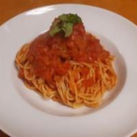 Spaghetti with Meatballs · Spaghetti topped in our homemade meatballs.